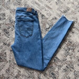 American Eagle light denim jean w/destroyed hem size 12 X-long